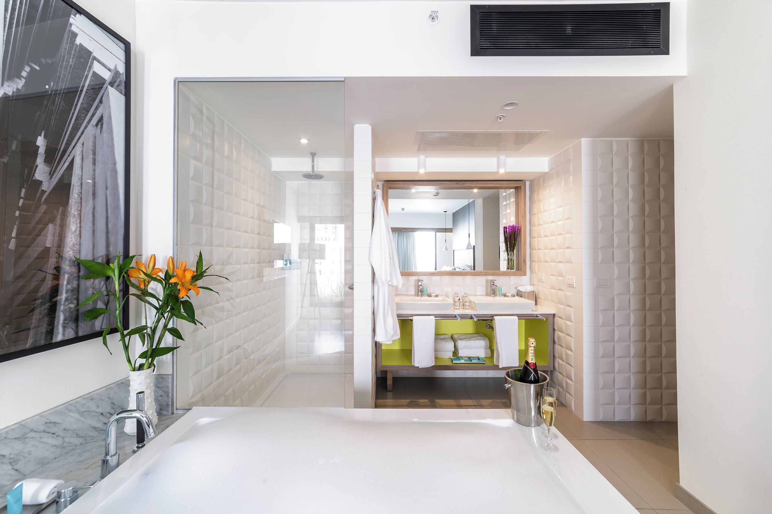 designer toiletries, hair dryer, towels, soap