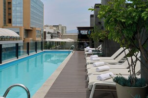 Outdoor pool, pool umbrellas, sun loungers