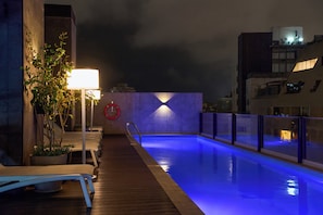 Outdoor pool, pool umbrellas, pool loungers