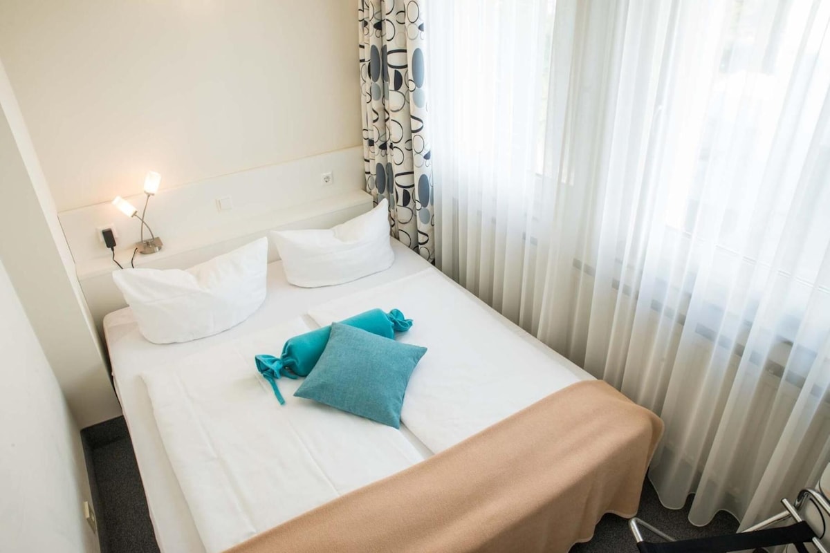 Desk, blackout drapes, WiFi (free), bed sheets