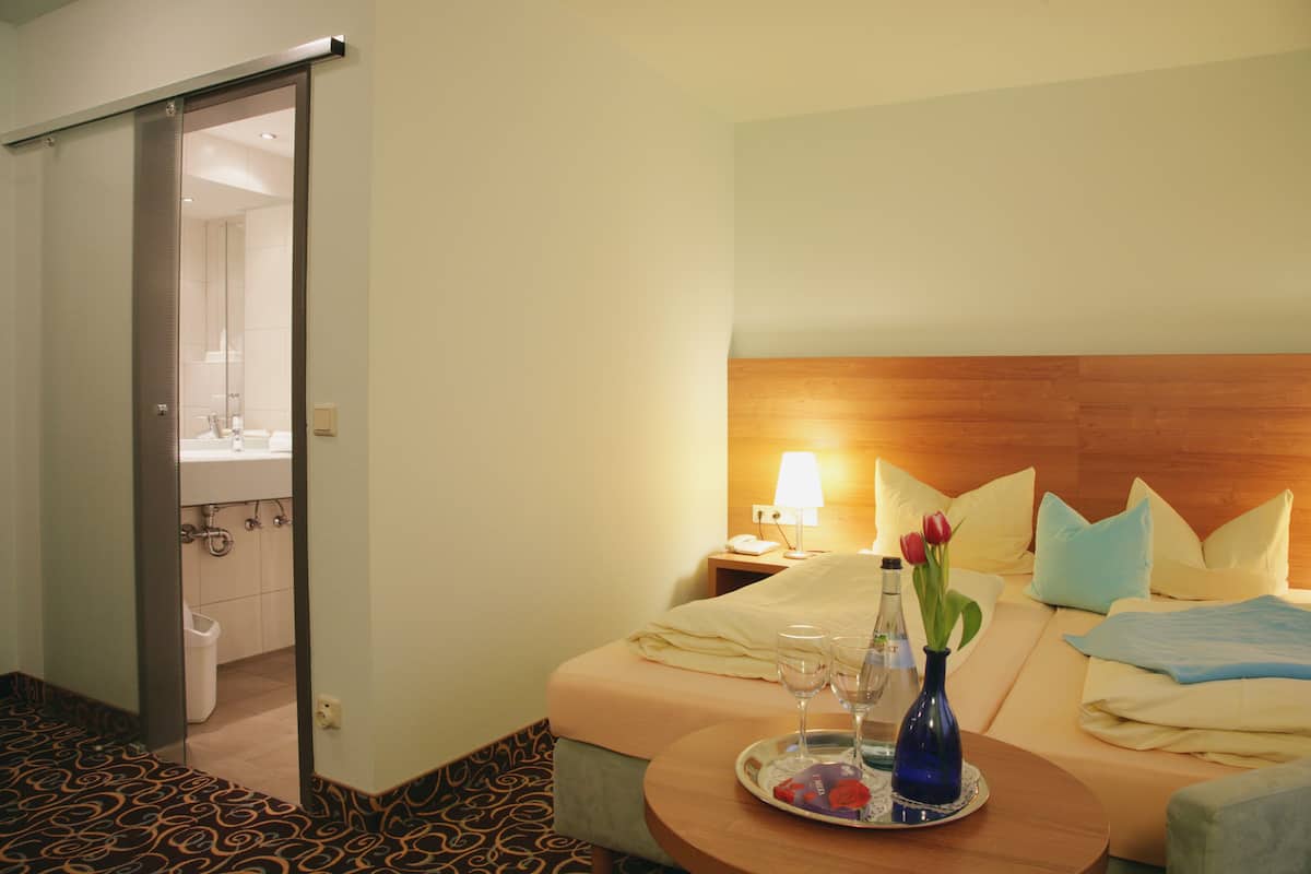 Desk, blackout curtains, free WiFi, bed sheets