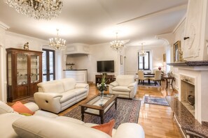 Deluxe Apartment, Multiple Beds, Non Smoking | Living area | Plasma TV