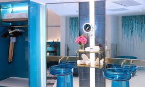 Hair dryer, bathrobes, slippers, towels