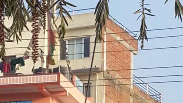 A multi-story building with balconies and windows. - Tamang Homestay (Dhulikhel)