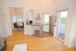 Apartment, 2 Bedrooms | Private kitchen | Fridge, microwave, oven, stovetop