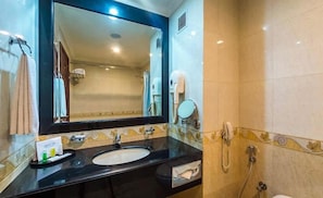 Jetted bath, rainfall showerhead, free toiletries, hair dryer
