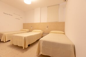 Triple Room (Interior) | Minibar, individually decorated, individually furnished, desk