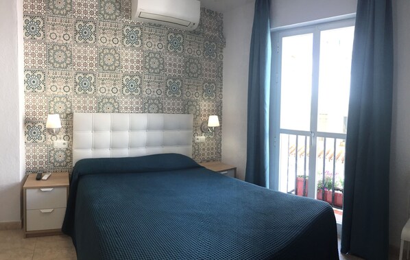 Double Room, Balcony | Minibar, individually decorated, individually furnished, desk