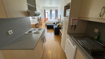 Huoneisto | Pimennysverhot, ilmainen Wi-Fi, vuodevaatteet