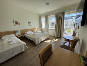 Family Quadruple Room, Private Bathroom | Blackout curtains, free WiFi, bed sheets - Hótel Borgarnes (Borgarnes)