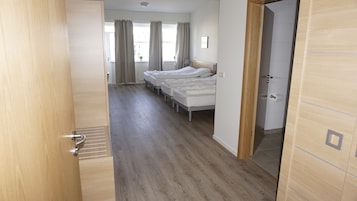 Family Quadruple Room, Private Bathroom | Blackout drapes, free WiFi, bed sheets