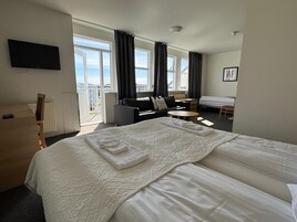 Triple Room, Private Bathroom | Blackout drapes, free WiFi, bed sheets