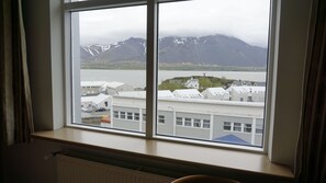 Twin Room, Private Bathroom | Blackout drapes, free WiFi, bed sheets - Hótel Borgarnes (Borgarnes)