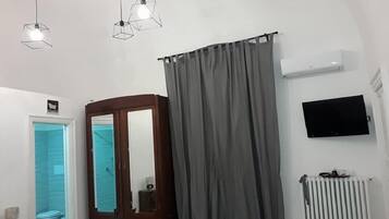 Habitació triple, diversos llits, no fumadors | Equipament de l'habitació