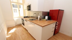 Basic Quadruple Room, 2 Bedrooms, Kitchen | Private kitchenette | Espresso maker, fridge, oven, stovetop - Zizka Home Apartments (Prague)