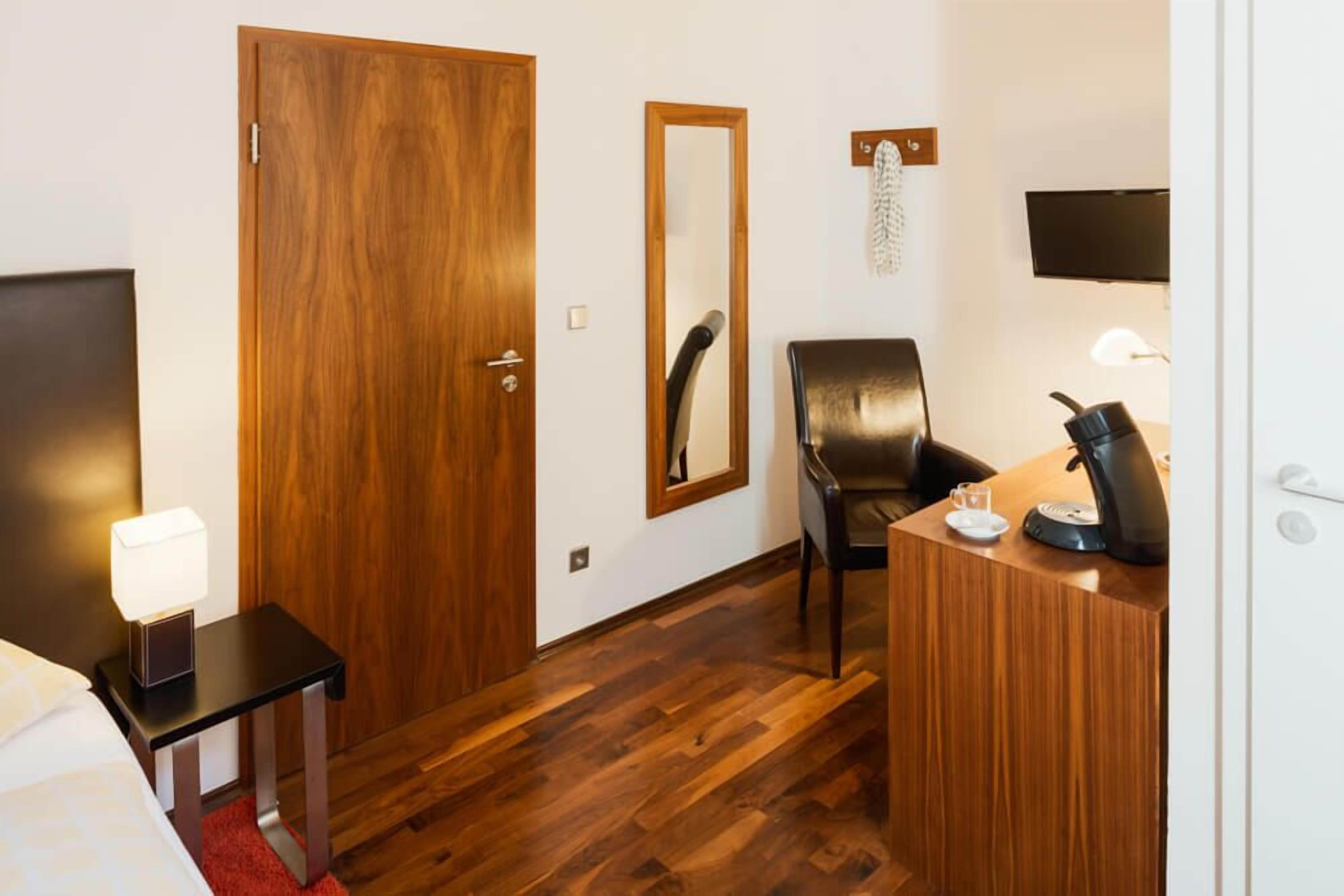 superior single room | living area | plasma tv