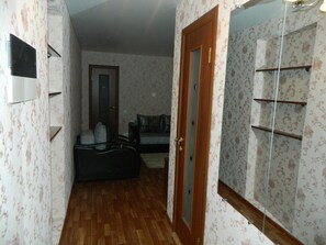 Apartment (B-46) | Living area | Flat-screen TV - Megapolis Apartments on Plekhanovskaya street 25 – apt 46 (Voronezh)