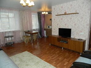 Apartment (B-46) | Living room | Flat-screen TV - Megapolis Apartments on Plekhanovskaya street 25 – apt 46 (Voronezh)