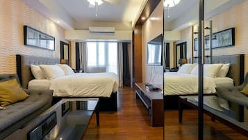 Studio Eksekutif | Seprai premium, tempat tidur Select Comfort, minibar, dan brankas