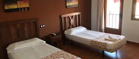 Desk, blackout drapes, free cribs/infant beds, rollaway beds