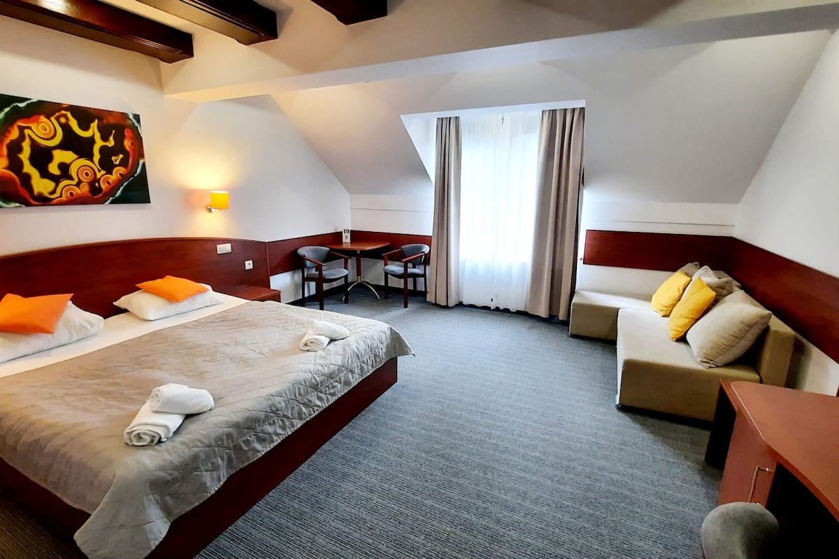 apartment | desk, blackout curtains, iron/ironing board, free cots/infant beds