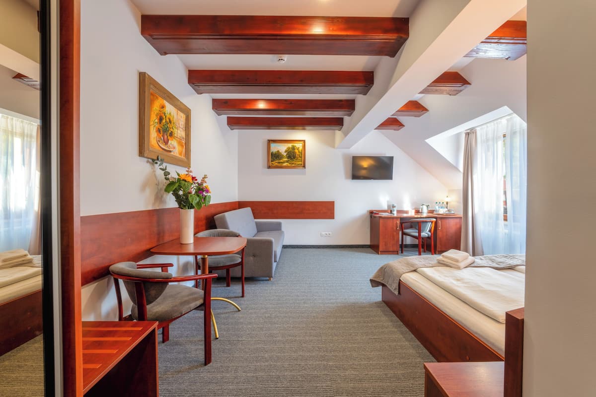 apartment | desk, blackout curtains, iron/ironing board, free cots/infant beds