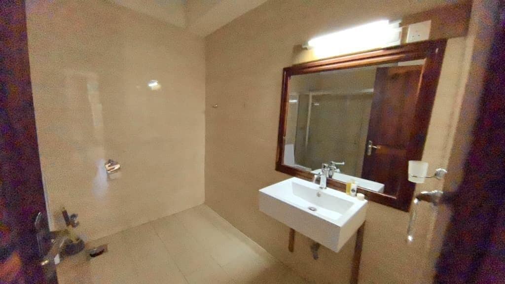 deep-soaking bathtub, rainfall showerhead, free toiletries, hair dryer