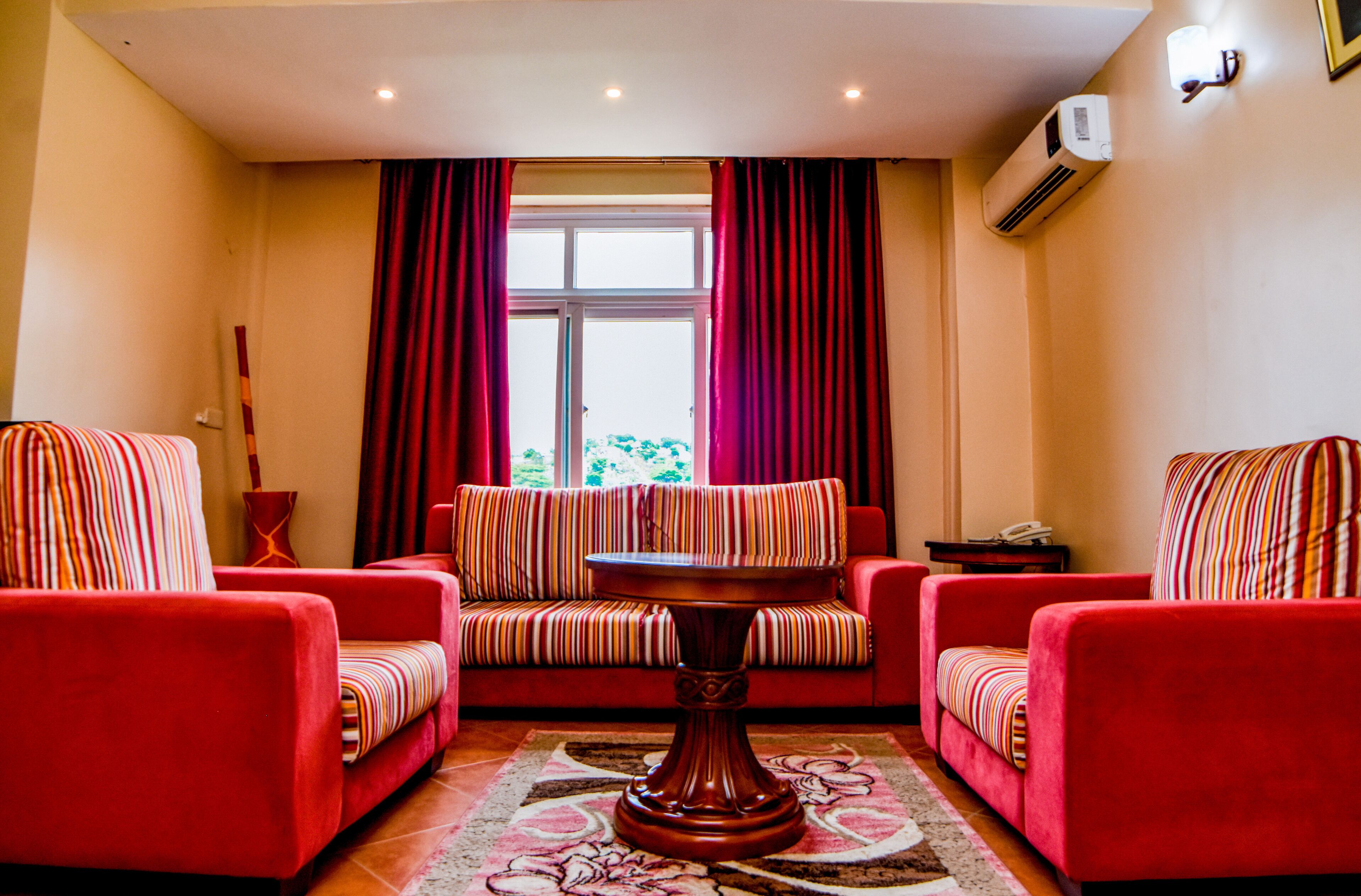 double or twin room | living area | flat-screen tv