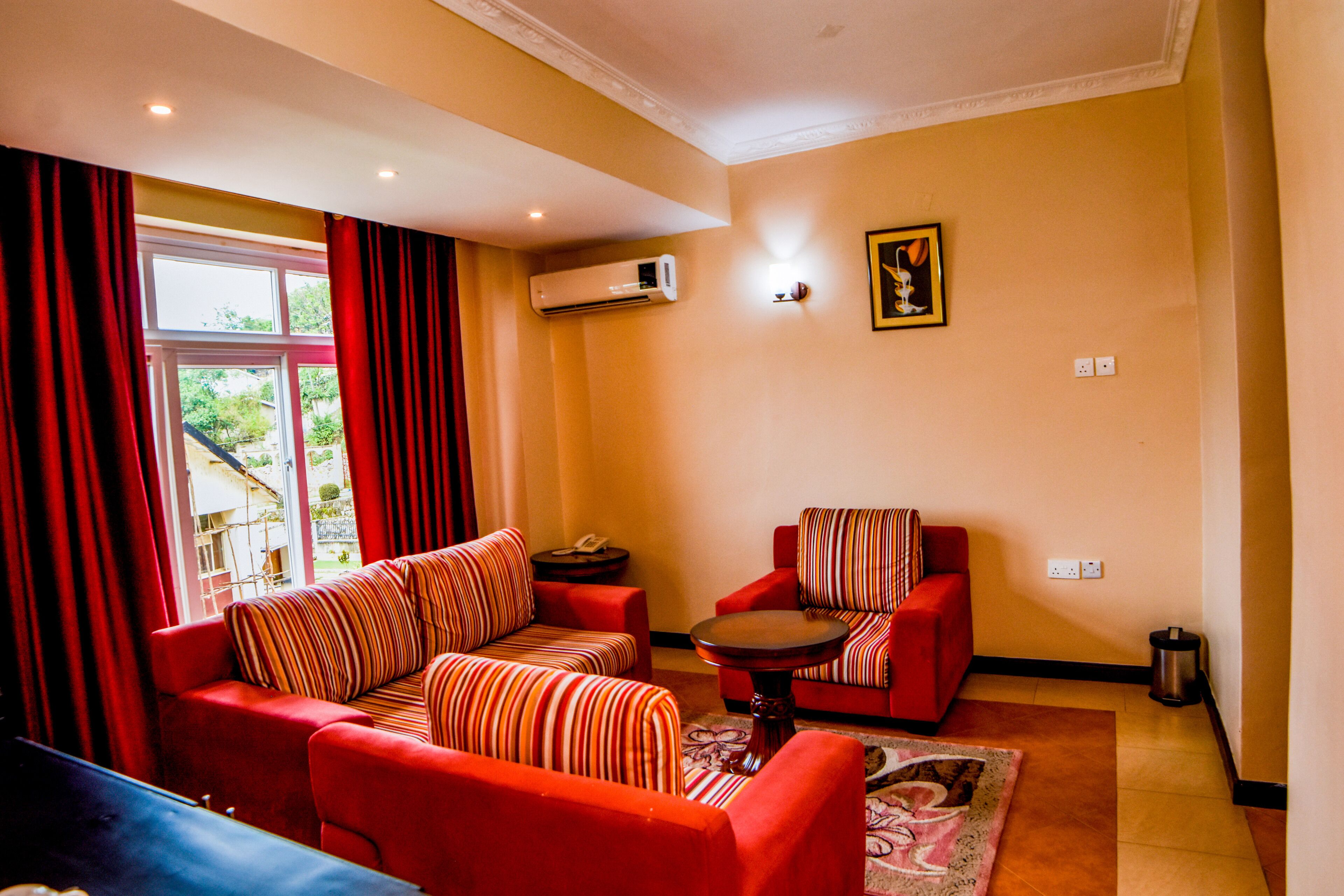 double or twin room | living area | flat-screen tv