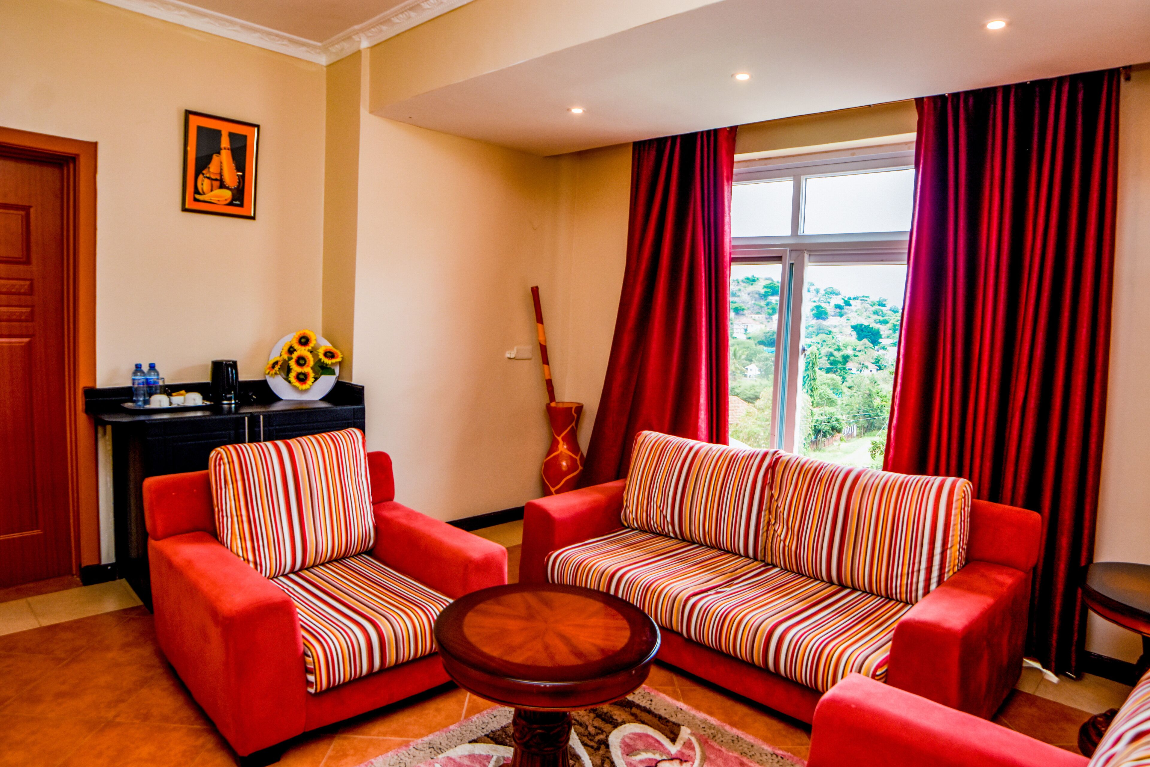 double or twin room | living area | flat-screen tv