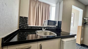Estudio Individual | Cocina privada | Frigobar