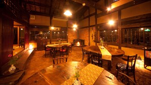 A traditional inn with wooden interiors, a fireplace, and multiple dining areas. - Yufuin TAGASODE (Yufu)