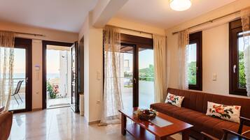 Duplex, 2 Bedrooms, Beachside | Living area | Flat-screen TV