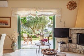 Exclusive Villa, Multiple Beds, Garden View | Living area - Lavender Garden Retreat - Secluded Seaside Getaway (West Mani)