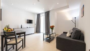 32-inch flat-screen TV with digital channels, TV