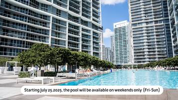 Outdoor pool, a heated pool, open 6 AM to 7 PM, free pool cabanas