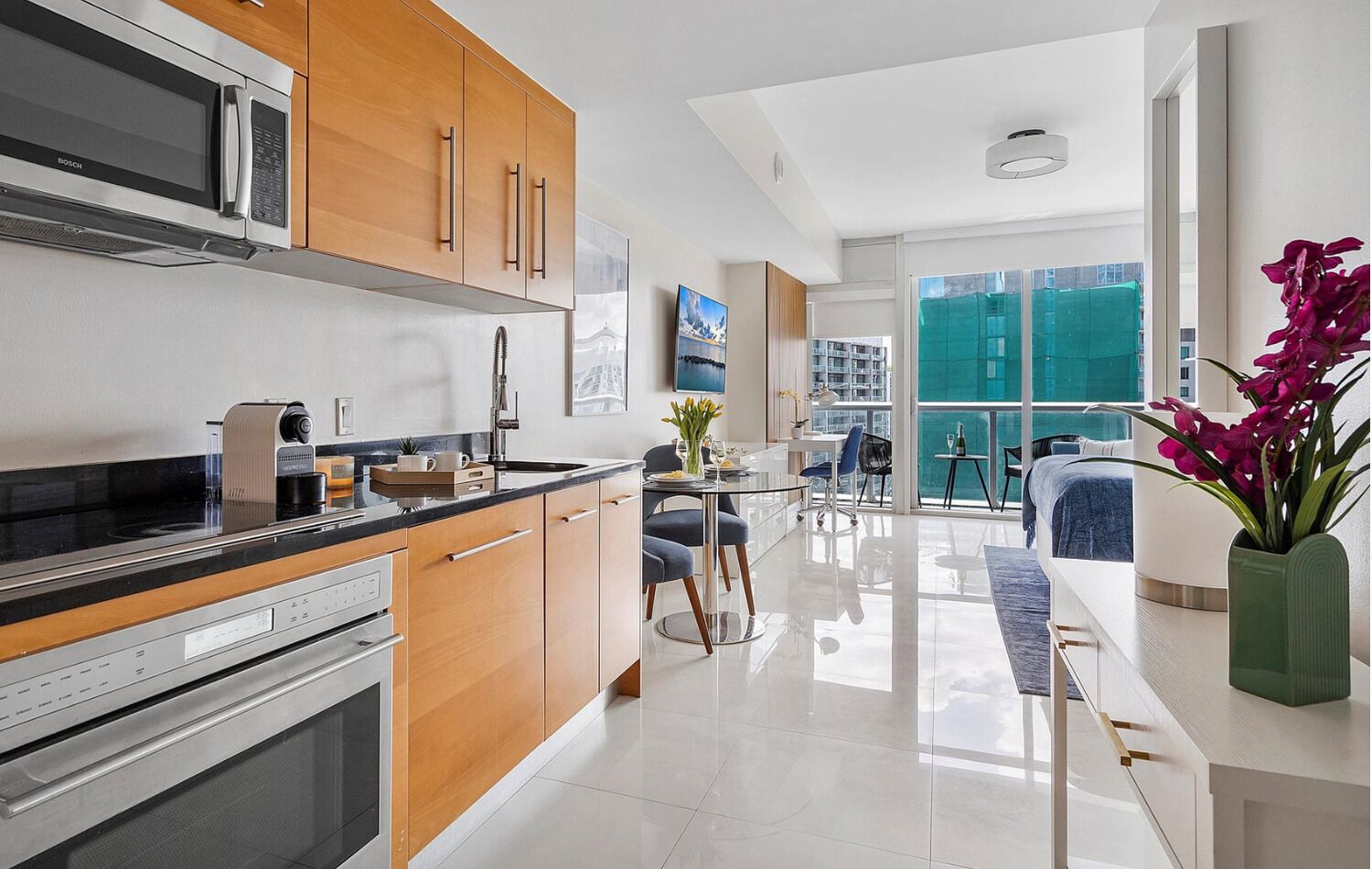 Premium Studio, 1 Queen Bed, Balcony, Lake View | Living area | 50-inch Smart TV with digital channels, TV