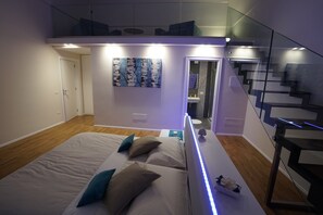 Suite | Desk, laptop workspace, blackout drapes, soundproofing