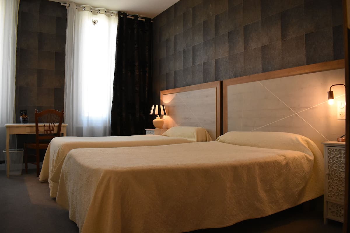 twin room | minibar, in-room safe, desk, blackout curtains