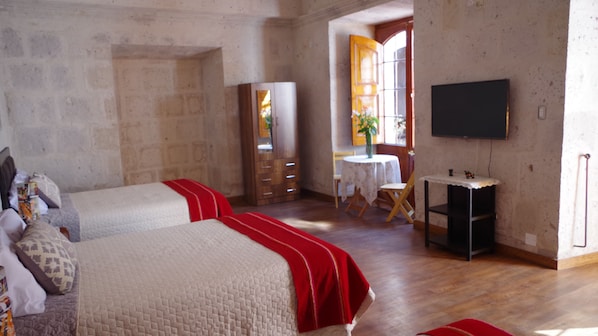 Premium bedding, down duvets, in-room safe, rollaway beds