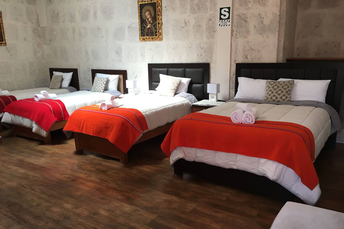 Premium bedding, down duvets, in-room safe, rollaway beds