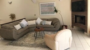 Family House, 3 Bedrooms, Beachfront | Living area | 55-inch Smart TV with cable channels, TV, Netflix - Treasure of Sun Oceanfront Beach House (Tijuana)