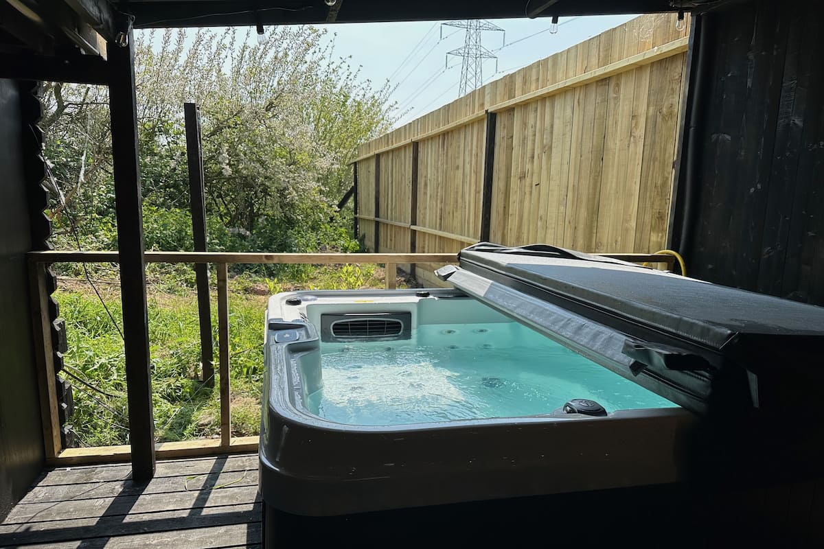 Familie huisje, 1 slaapkamer, hot tub, uitzicht op tuin | Terras
