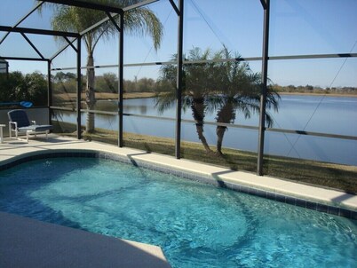 4 bedroom 2 storey pool home with stunning lake views on gated community