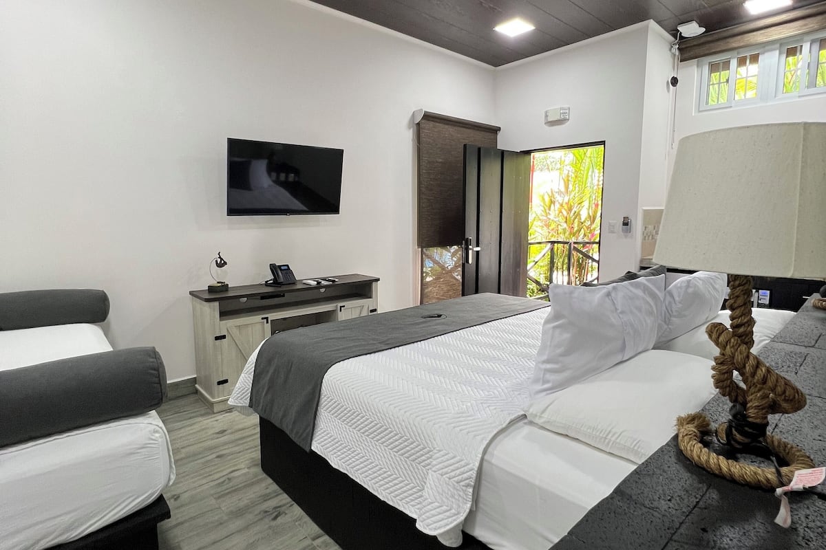 Superior Room, Pool View | Premium bedding, in-room safe, individually decorated, blackout drapes