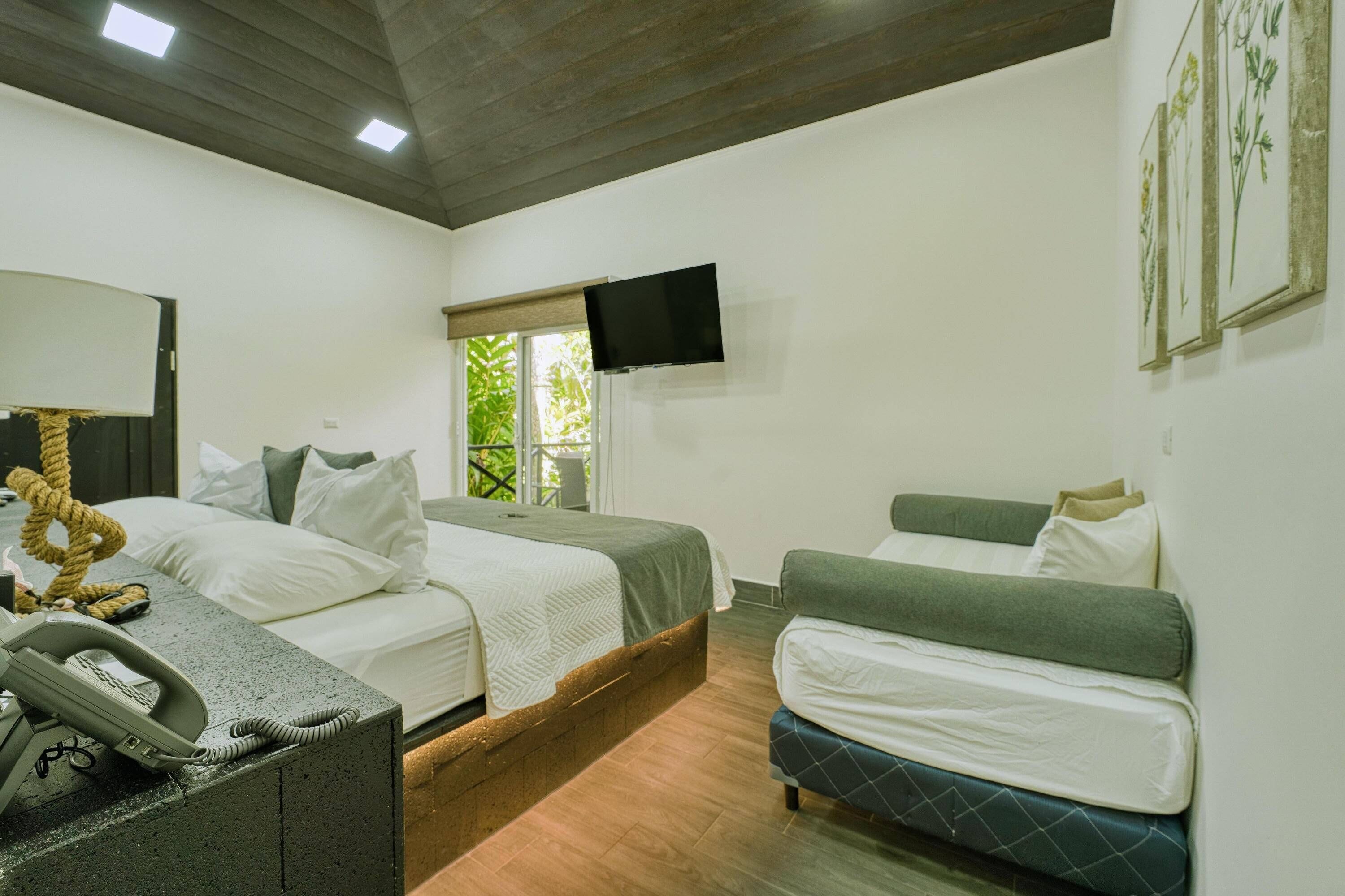 Premier Room | Premium bedding, in-room safe, individually decorated, blackout drapes