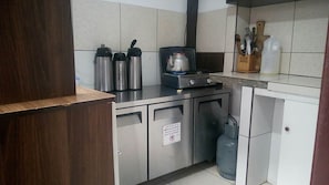 Fridge, stovetop, cookware/dishes/utensils