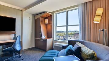 Desk, laptop workspace, iron/ironing board, cribs/infant beds