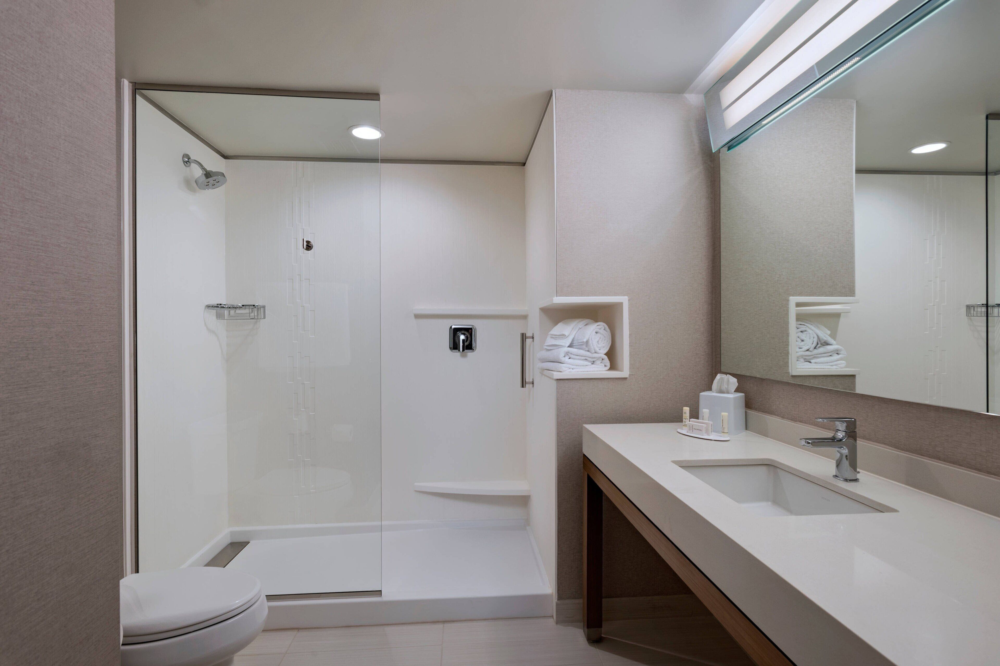 hydromassage showerhead, free toiletries, hair dryer, towels