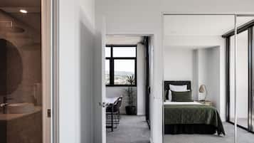 Desk, laptop workspace, blackout curtains, iron/ironing board